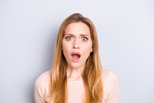 Oh no! People person insult concept. Close up portrait of frustrated confused upset terrified beautiful crying with open mouth big eyes woman isolated on gray background copy-space