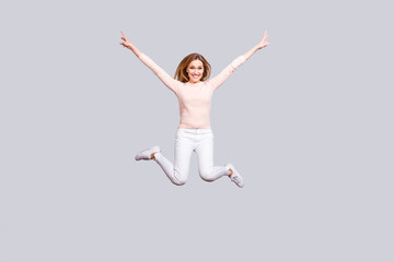 Fototapeta na wymiar Fall beauty fashion style stylish modern entertainment people person weekend holiday vacation concept. Full-length full-size portrait of cheerful delightful lady jumping up isolated on gray background