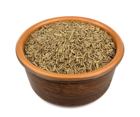 Cumin seeds or caraway isolated on white background