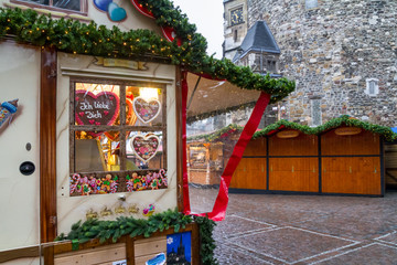 View of the counter with sweets and gingerbread at the Christmas Market, city of Aachen, North Rhine-Westphalia, Germany