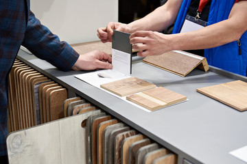 Buyer and seller in hardware store