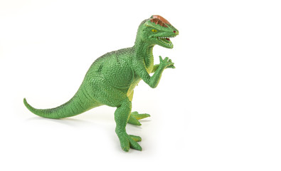 Dinosaur toy with open mouth on the white