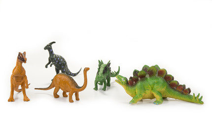 Dinosaur toy with open mouth on the white