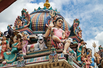 The Sri Mariamman Hindu Temple in Chinatown, Singapore. Fragment of decoration with painted figures of Hindu gods and deities.