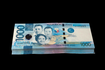 Photo of money in cash of one thousand philippines peso - obrazy, fototapety, plakaty
