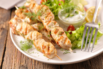 chicken kebab and salad
