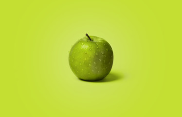 Fresh and wet green apples on the green color background, water drops