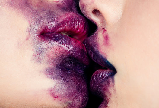 Sensual make-up. Sexy kiss between lesbians. Female body and lips close-up. Sex and homosexual family. Lipstick kiss. Purple lips. Mouth close-up. Big Lips, Beautiful Lipstick