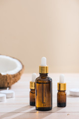 Healthy skincare. Pure coconut oil is made from organic coconut on wooden background