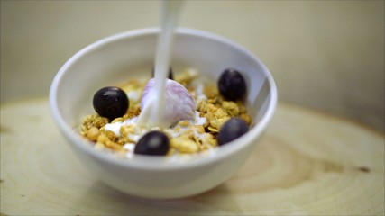 Milk with berries. The berries are filled with milk.