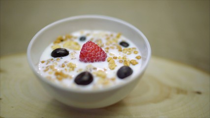 Milk with berries. The berries are filled with milk.