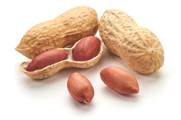 Useful peanut, close-up, isolated on white background.