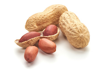 Useful peanut, close-up, isolated on white background.
