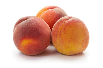 Fototapeta na wymiar Fresh peaches, close-up, isolated on white background.
