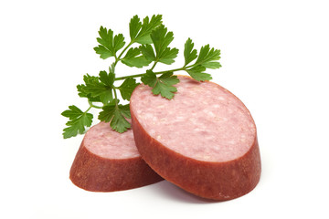 Salami smoked sausage slices isolated on white background.