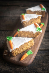 Slices of glazed carrot cake,selective focus