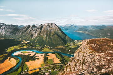 Mountains landscape aerial view fields and river in Norway Travel scenery scandinavian nature Andalsnes Romsdalseggen ridge