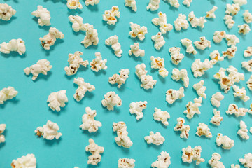 popcorn on color background