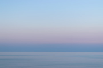 Colorful sunset sky and sea  with blurred motion.