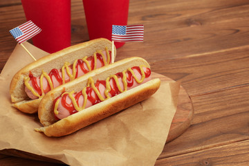 Hot dogs on wooden background