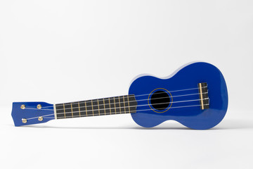 A blue ukulele set against a white background