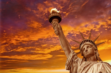 Statue of Liberty, dramatic sky background. New York City, USA © Belikova Oksana