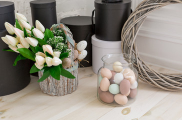 Chicken decorative eggs purple and basket with tulips in the basket, decoration