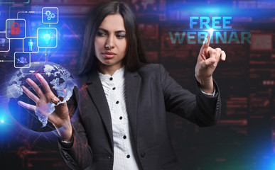 The concept of business, technology, the Internet and the network. A young entrepreneur working on a virtual screen of the future and sees the inscription: Free webinar