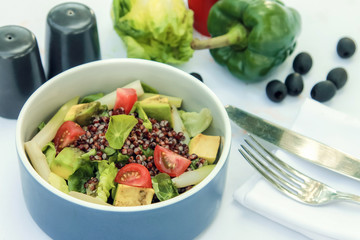 Fresh Avocado tomato and arugula salad healthy vegan food