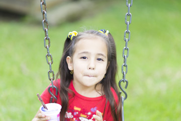 Happy Girl Drinking Milk or Yogurt