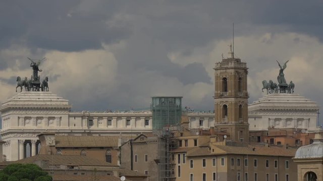 Bell tower and two quadrigas on a roof