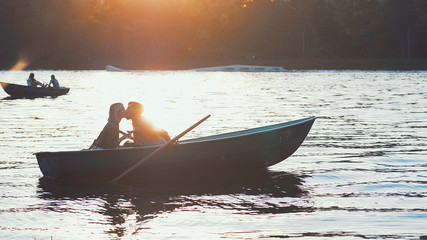 Kissing couple at sunset