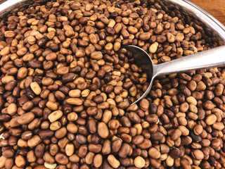  Brown kidney beans with metallic scoop close up