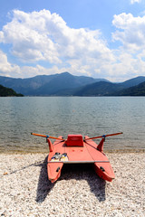 rescue boat on Lake Caldonazzo in Dolomites, Italy 