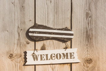 Wooden welcome sign in rustic style