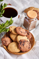 Open jar of instant coffee arranged on woden table, top view, close-up, selective focus.