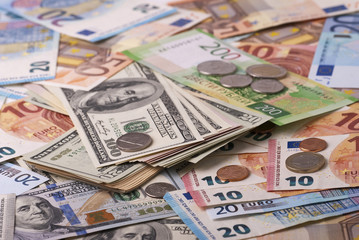 Fototapeta na wymiar Dollar, euro, ruble banknotes, coins