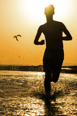 A man running on beach