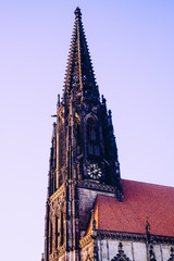 Close up of the church tower of the Ludgerikirche in Münster, Westfalen, Germany.
