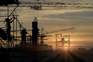 Cranes build large residential buildings .