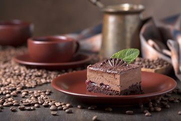 Chocolate cake with mint .