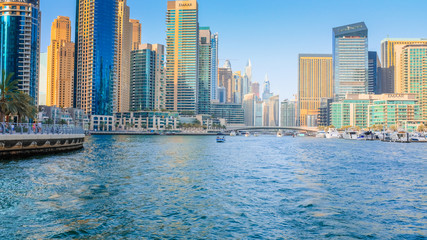 Fototapeta na wymiar Dubai Marina Towers with water view