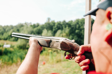 sports shooting plates targets hunter aiming shotgun