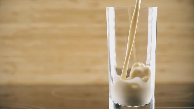 Pouring Soy Milk Or Soymilk Into Glass, Super Slow Motion Shot