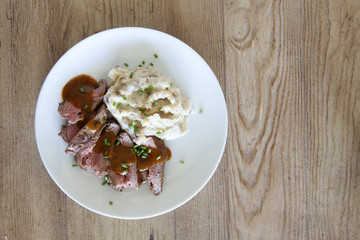 Sliced Beef and Mashed Potatoes