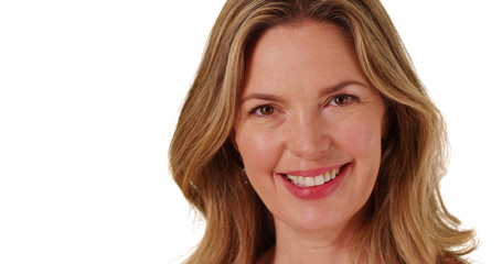 Close up of middle aged Caucasian woman smiling at camera 