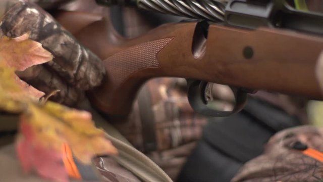 high speed shots of closing a bolt action rifle