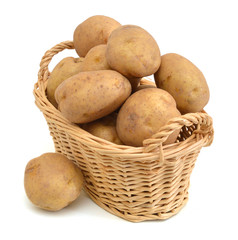 Fresh potatoes in basket isolated on white