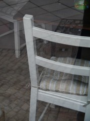 Holzstuhl mit Sitzkissen