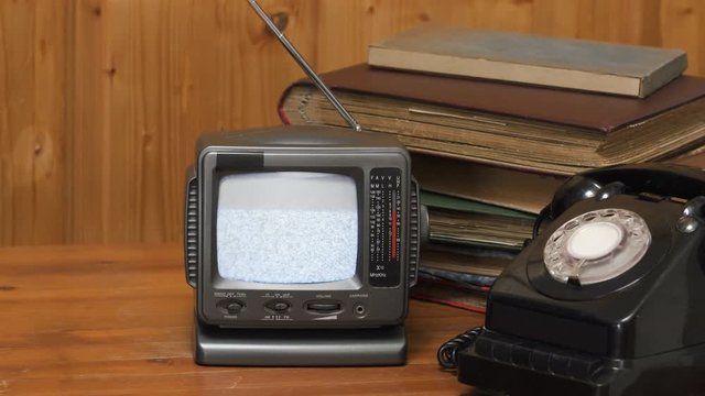 Turn on and turn off Old retro  Portable TV  Television. White noise on Black and White  Crt